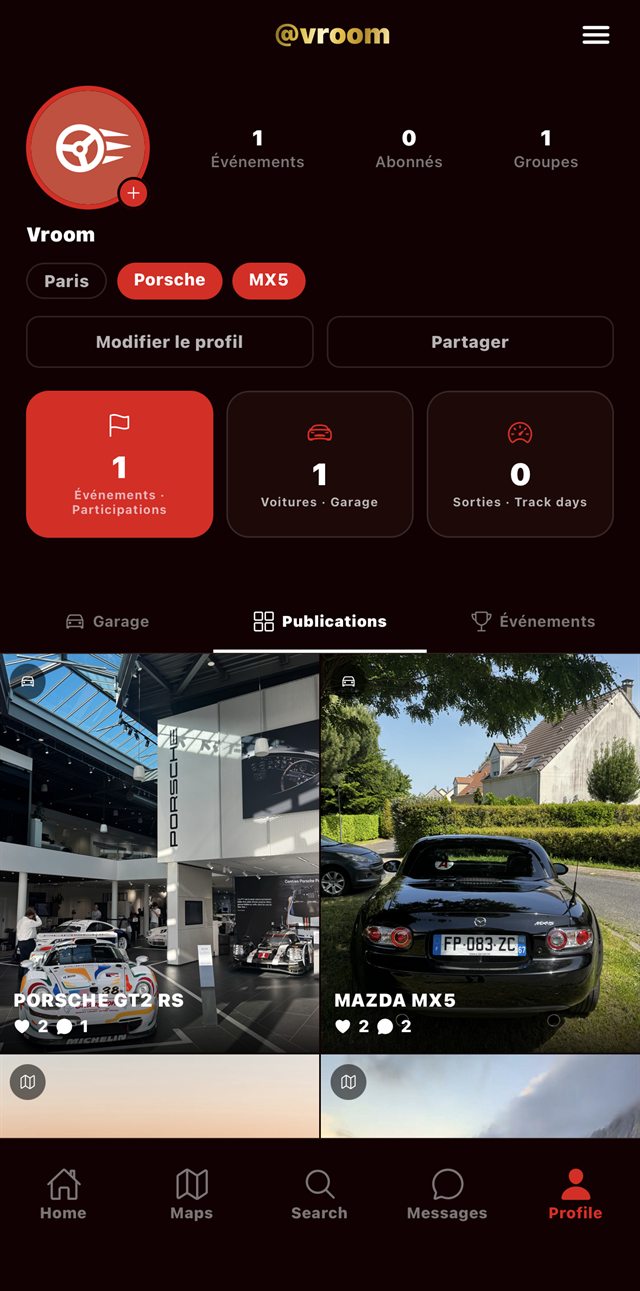 Un profil Vroom certifié : le pseudo @vroom en doré, l'anneau rouge autour de la photo, et la grille des publications.